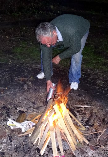 Tom lighting fire